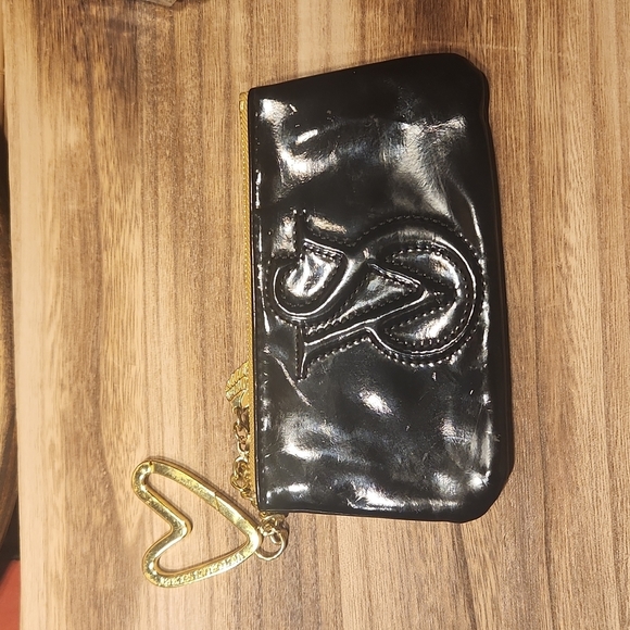 Victoria's Secret Handbags - Black and Gold Victoria's Secret Zip up wallet